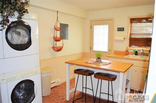 596 Old Post Road Edison, NJ 08817 - Photo 5 of 13 a bathroom with a sink a mirror and a window