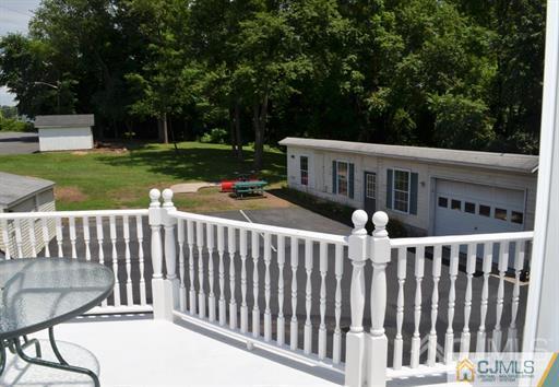 596 Old Post Road Edison, NJ 08817 - Photo 9 of 13 a view of a house with backyard and porch