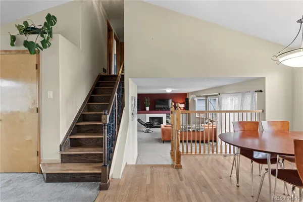 a view of a living room and dining room