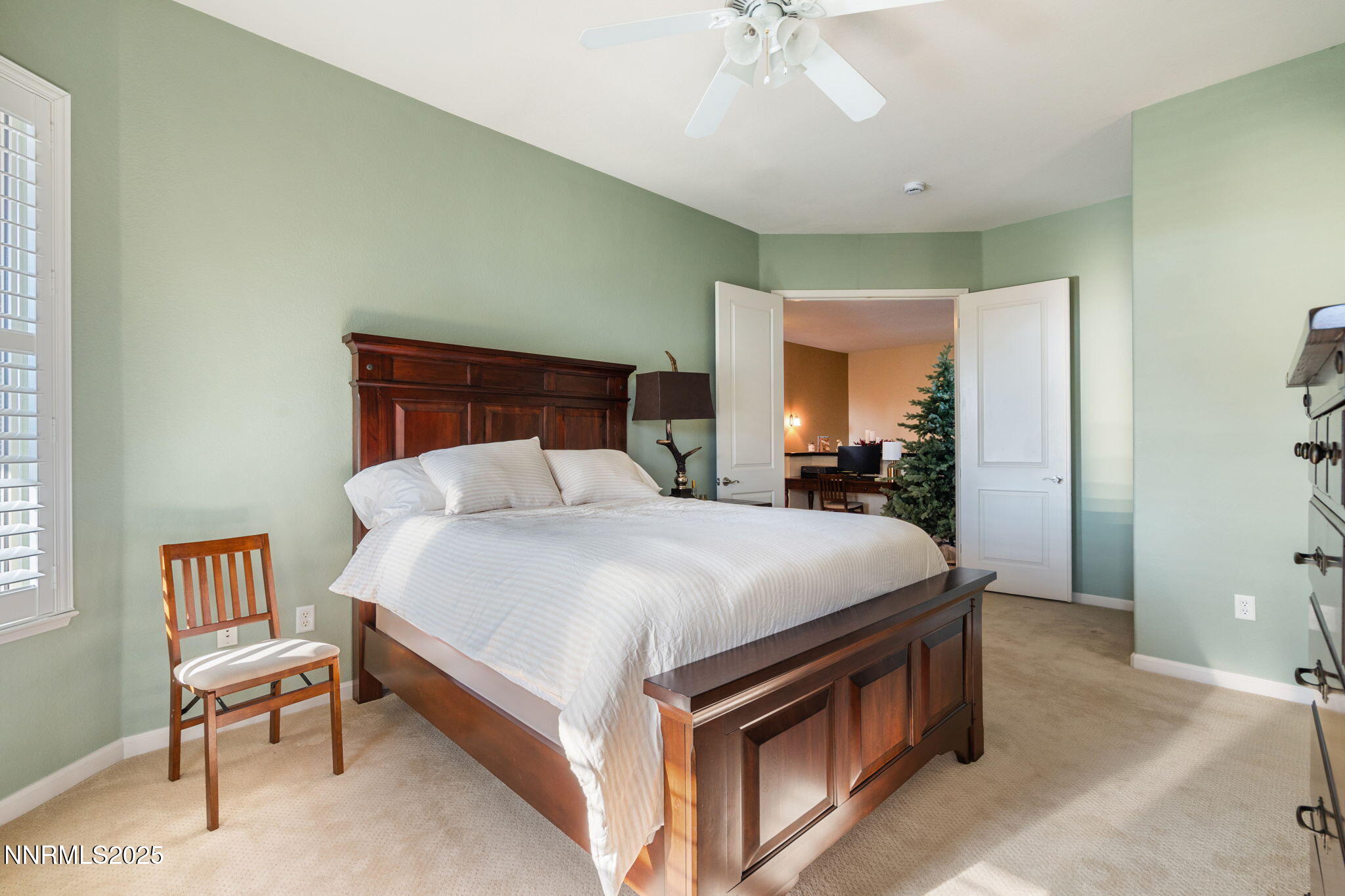 9900 Wilbur May Parkway, Unit 906 Reno, NV 89521 - Photo 21 of 44 a bed room with a bed and a chair