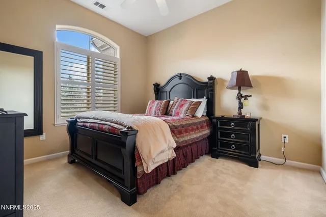 a bedroom with a bed and a closet