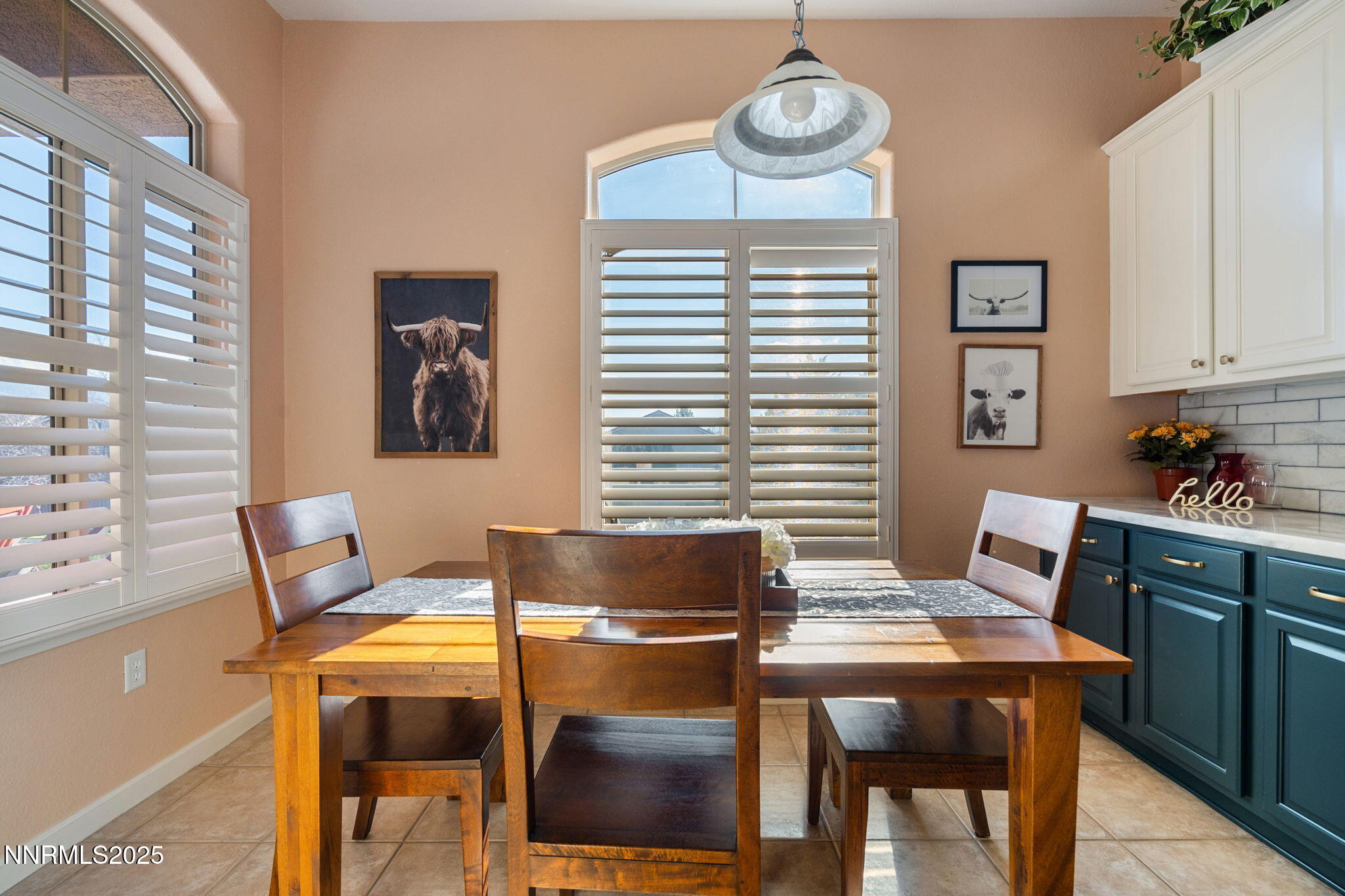9900 Wilbur May Parkway, Unit 906 Reno, NV 89521 - Photo 6 of 44 a view of a dining room with furniture and wooden floor