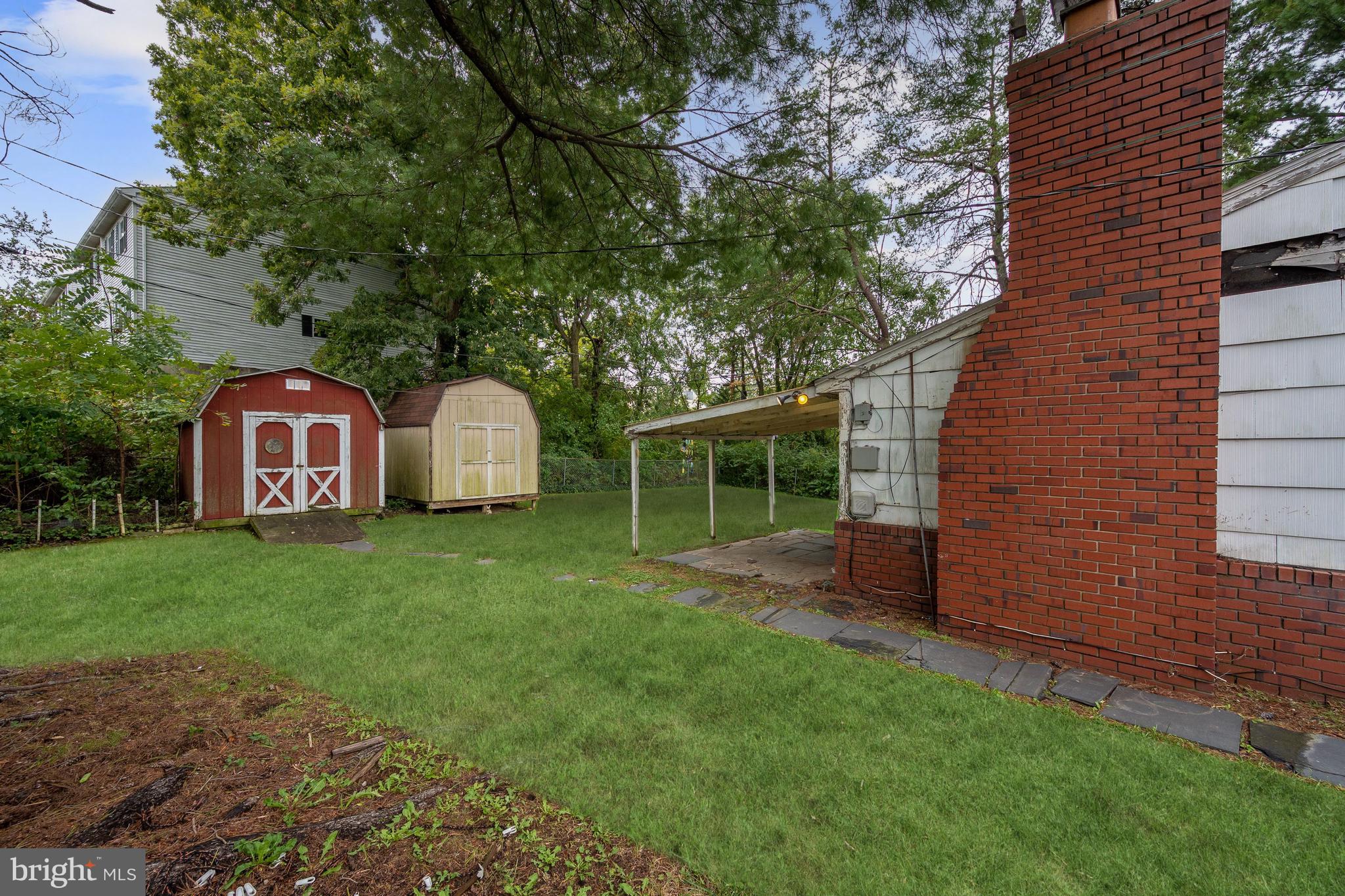 7121 Chamberlain Road Windsor Mill, MD 21244 - Photo 9 of 13 Fenced Backyard | Patio | Secure Storage