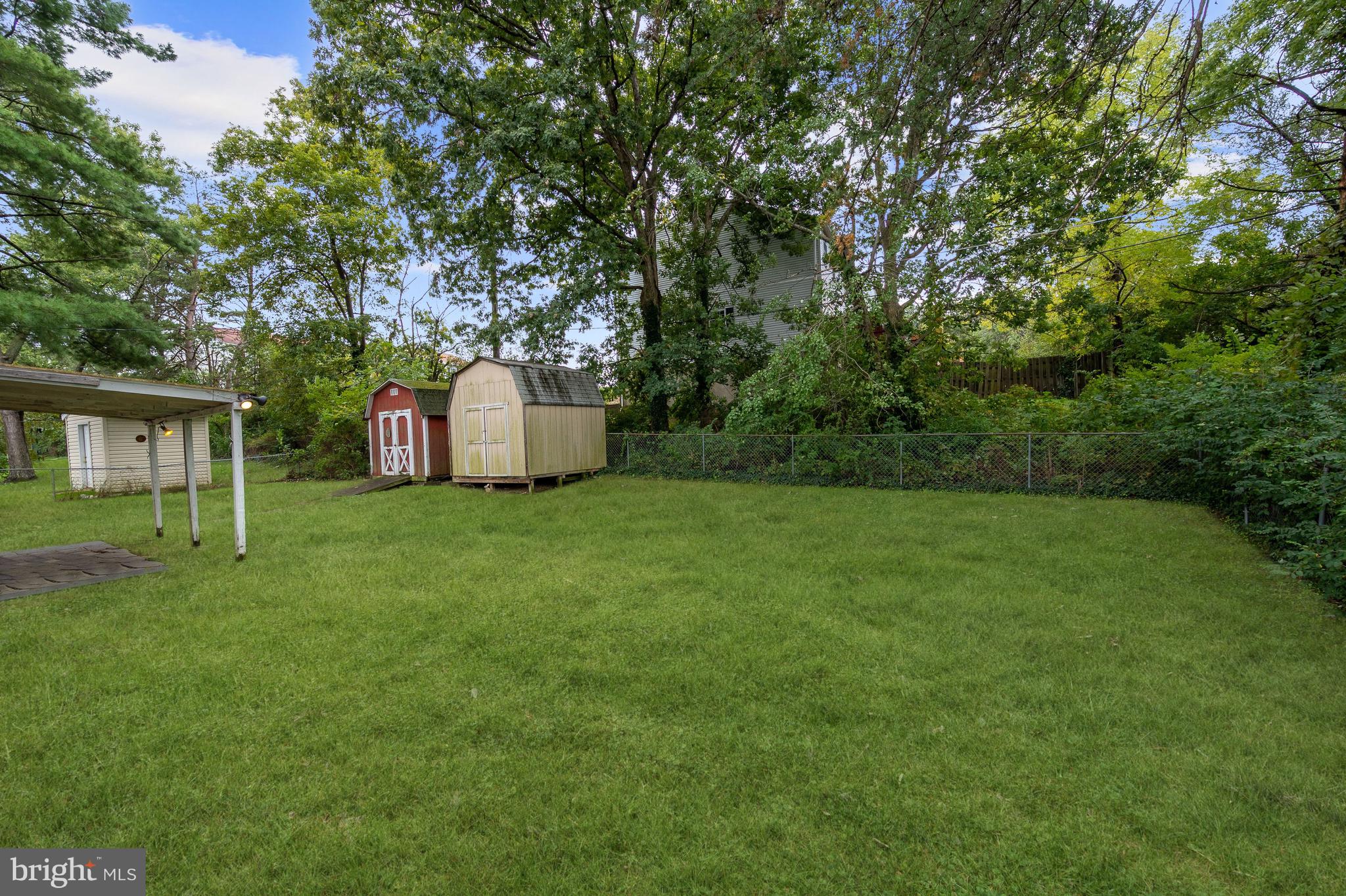 7121 Chamberlain Road Windsor Mill, MD 21244 - Photo 10 of 13 Fenced Backyard | Patio | Secure Storage