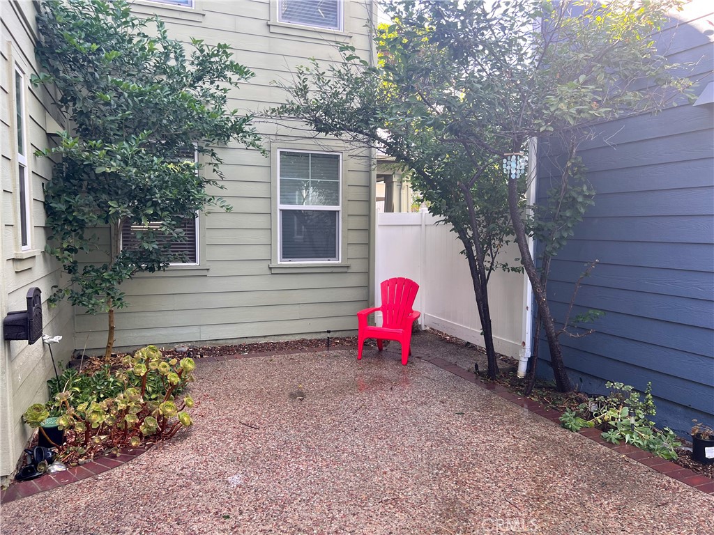 3 Paddock Place Ladera Ranch, CA 92694 - Photo 37 of 58 a view of a house with backyard and a garden