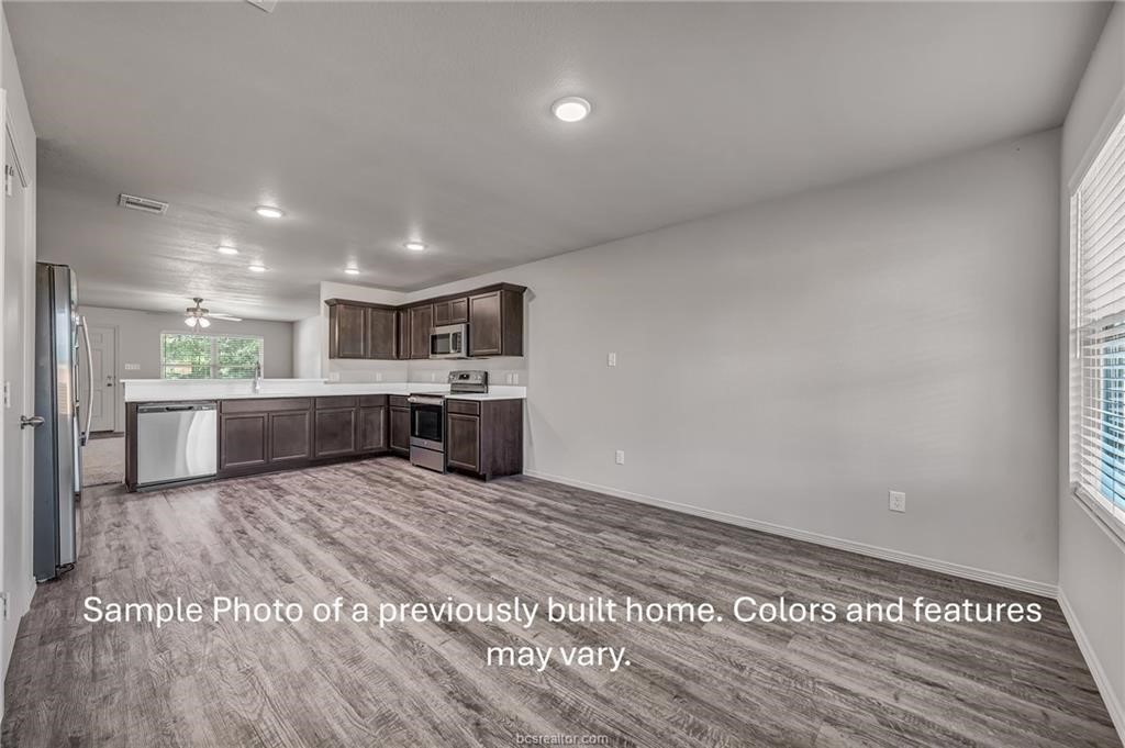 1629 Lucky Street Bryan, TX 77803 - Photo 7 of 12 **Photos are sample photos of similar plan. Colors and features might vary** Fridge not included.