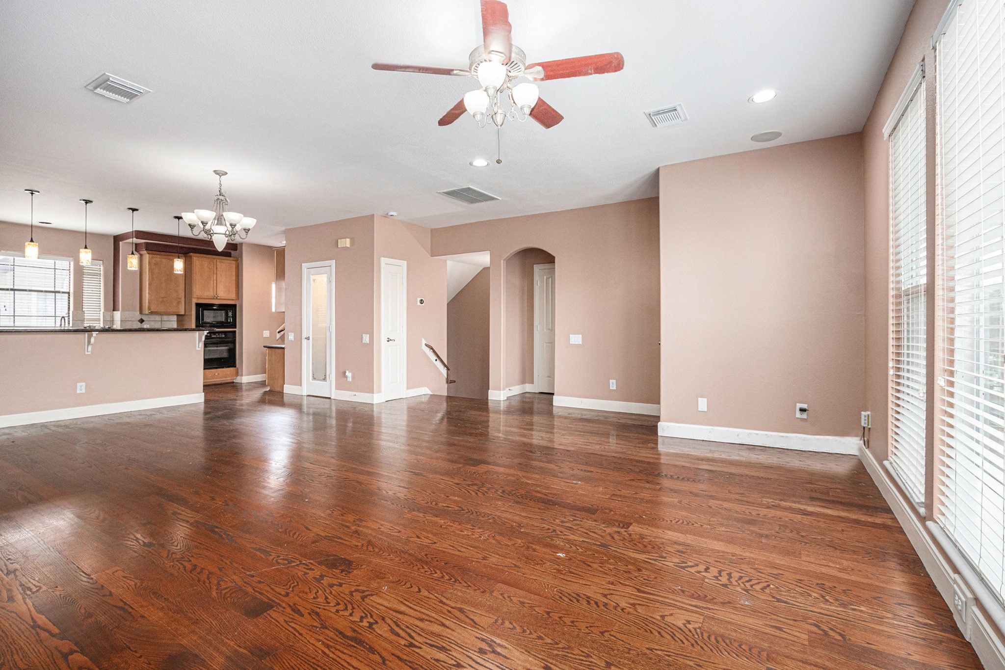 2402 Calumet Street, Unit B Houston, TX 77004 - Photo 11 of 44 View of the living room facing the entryway stairwell and kitchen.