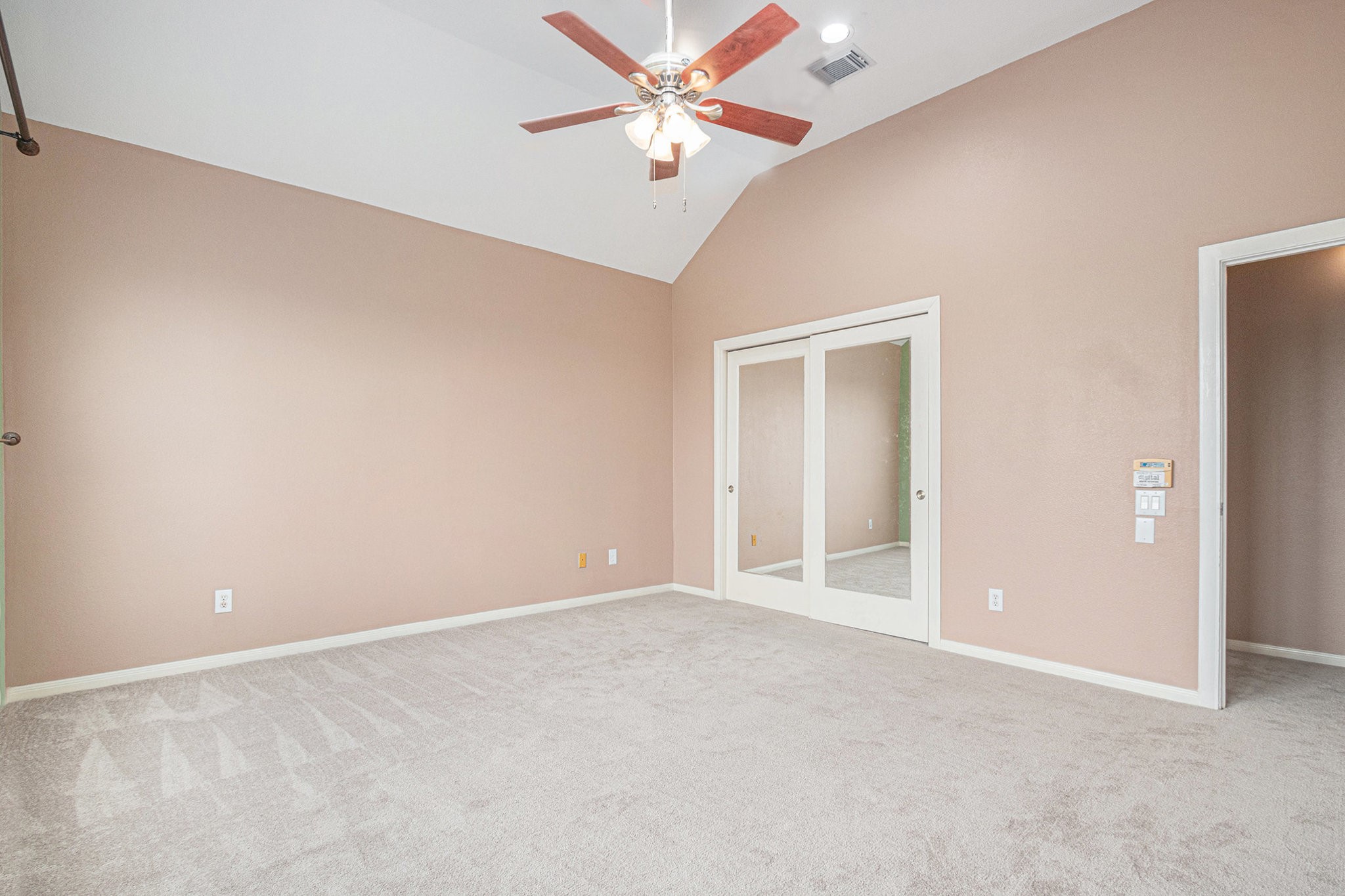 2402 Calumet Street, Unit B Houston, TX 77004 - Photo 23 of 44 an empty room with closet and a ceiling fan