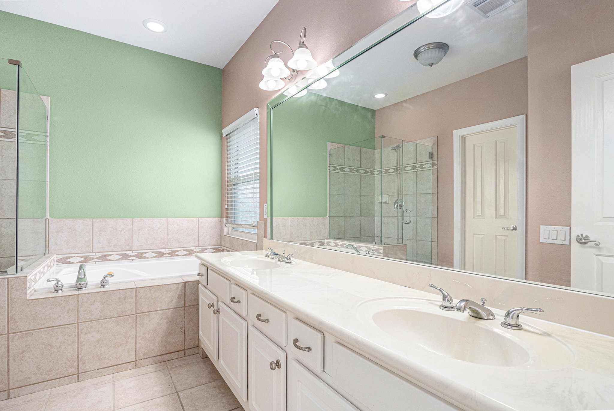 2402 Calumet Street, Unit B Houston, TX 77004 - Photo 24 of 44 a bathroom with a sink double vanity and a mirror