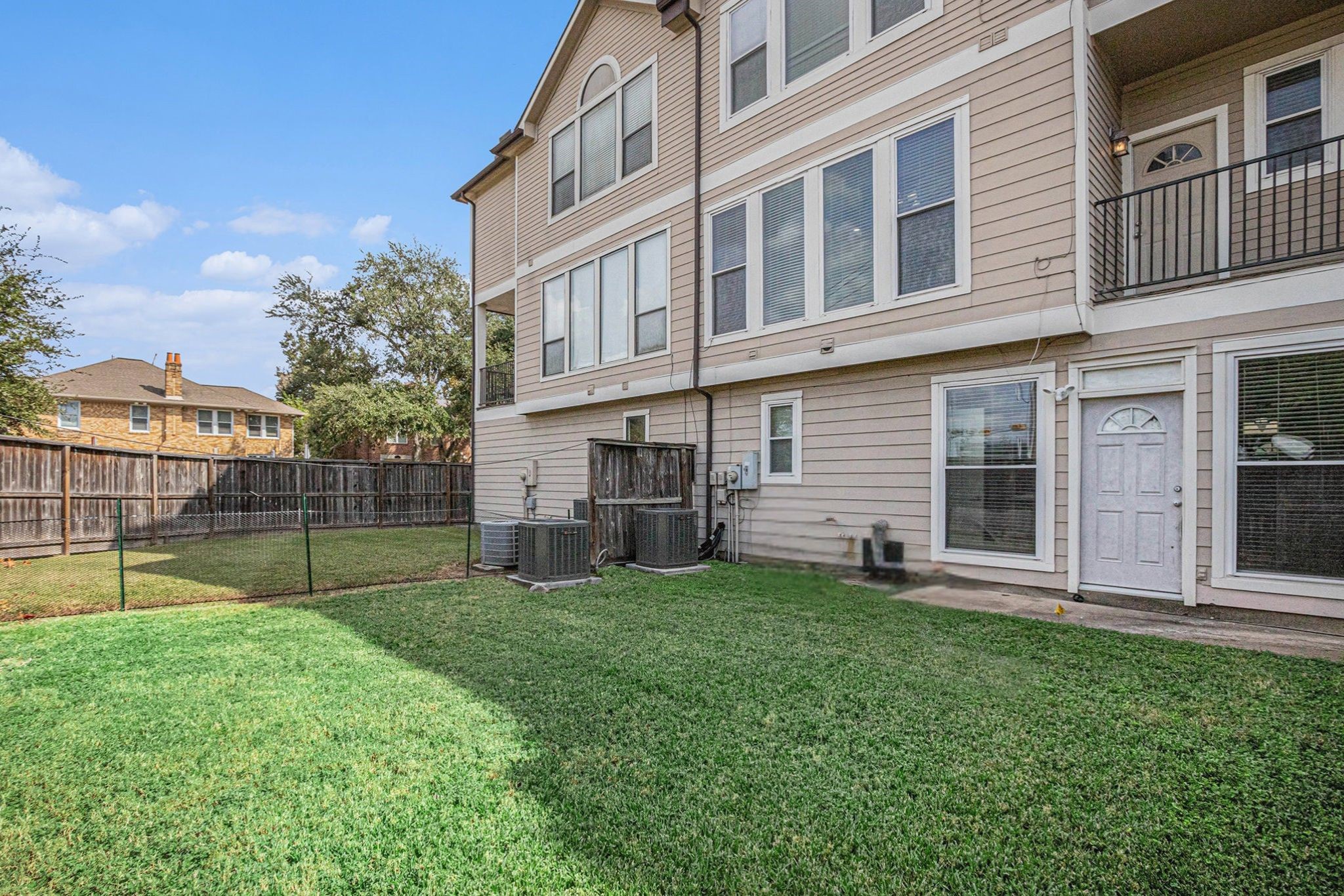 2402 Calumet Street, Unit B Houston, TX 77004 - Photo 41 of 44 a view of a house with a yard and sitting area
