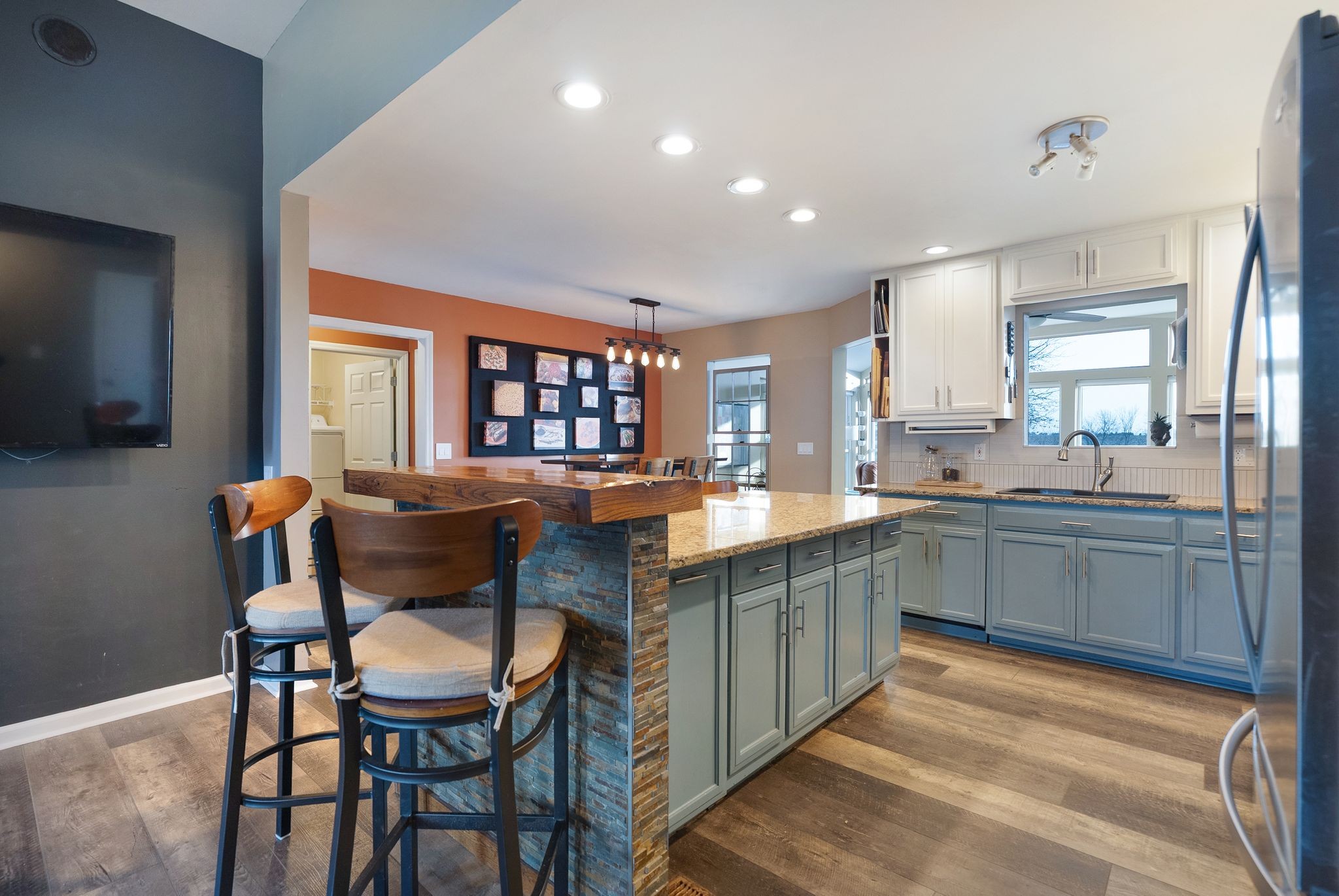 485 Rigney Road Manchester, TN 37355 - Photo 14 of 61 a kitchen with stainless steel appliances granite countertop a table chairs sink and window