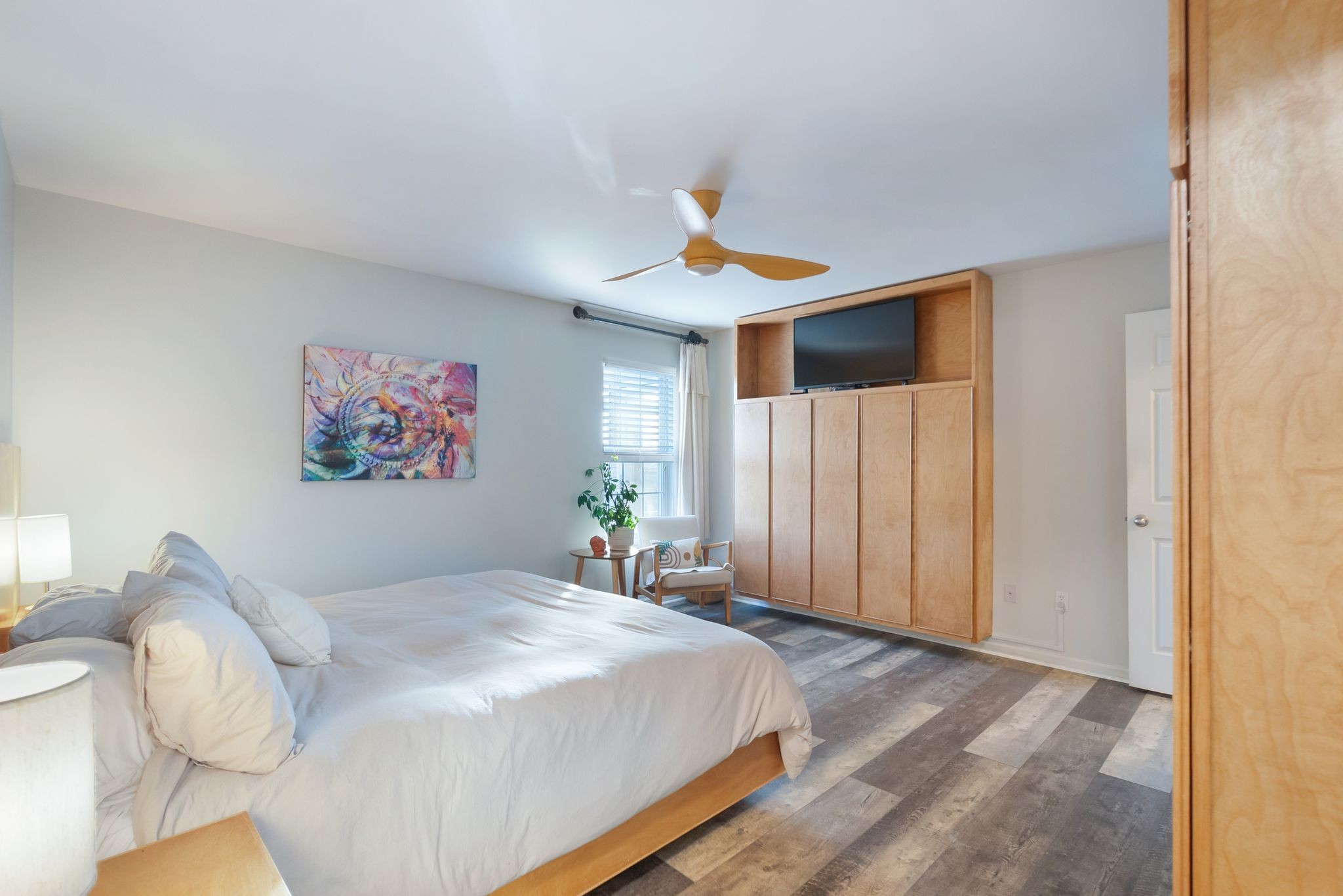 485 Rigney Road Manchester, TN 37355 - Photo 34 of 61 a bedroom with a bed and a painting on the wall