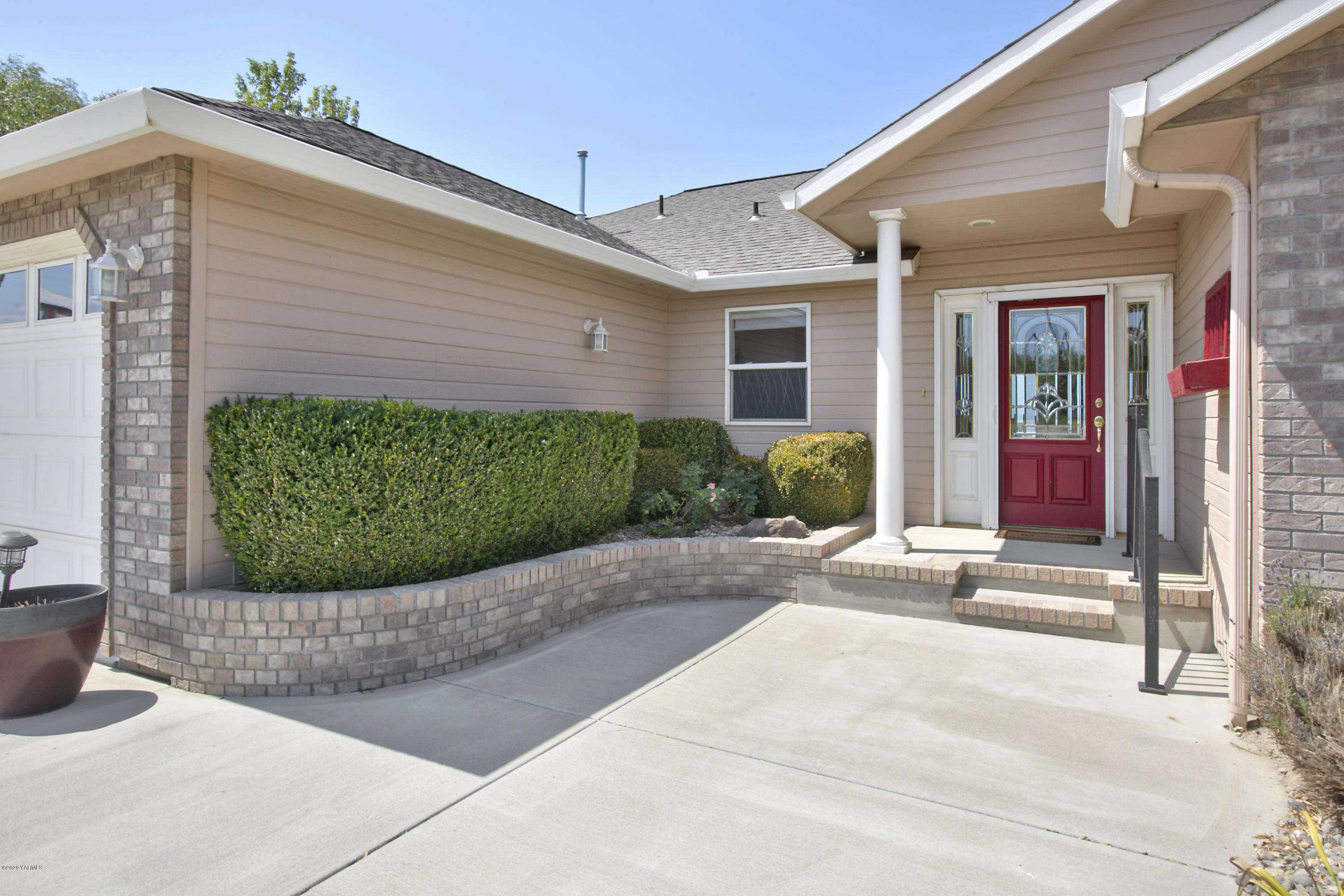 229 Konnowac Pass Road Moxee, WA 98936 - Photo 2 of 25 a view of a house with entertaining space