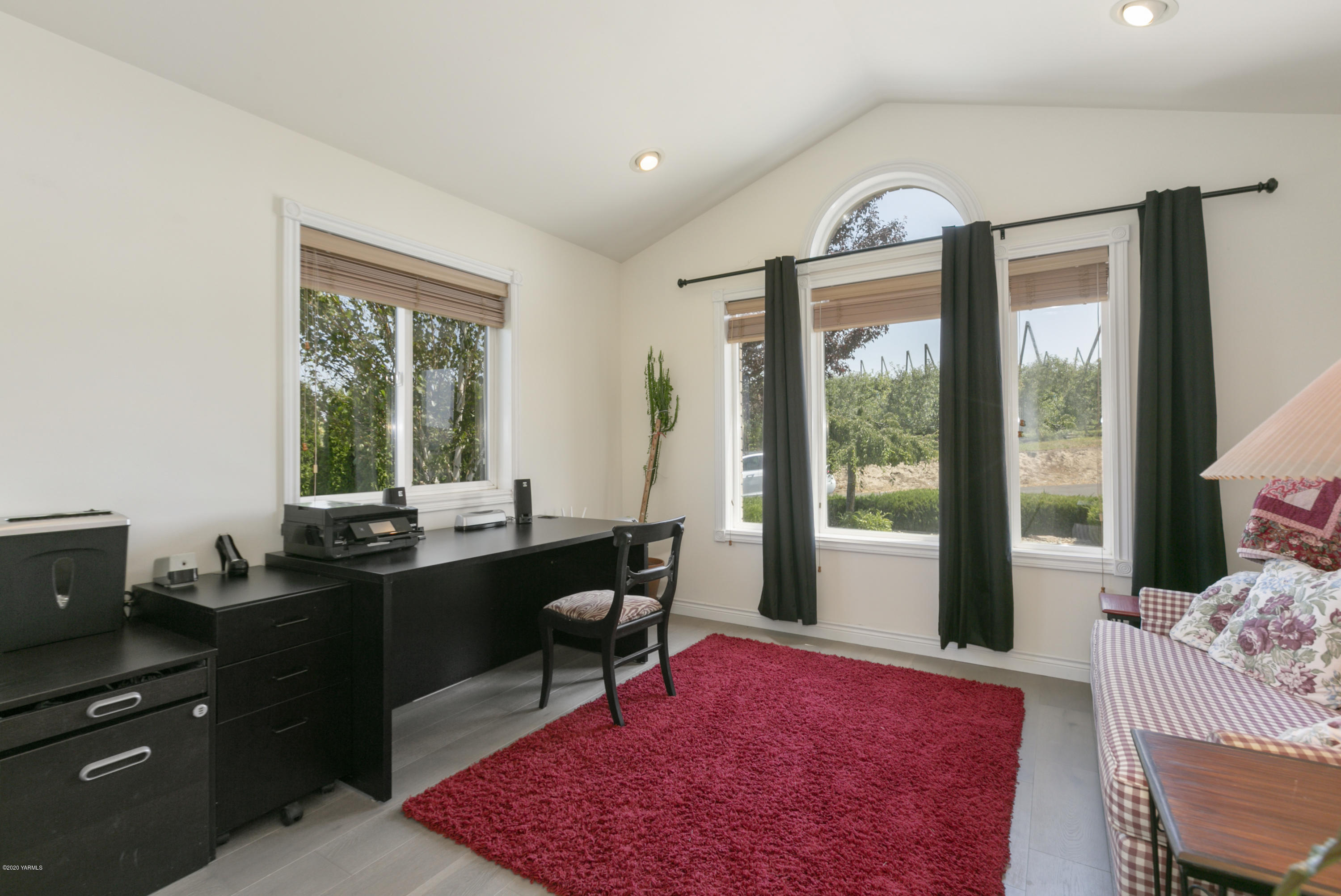 229 Konnowac Pass Road Moxee, WA 98936 - Photo 13 of 25 a view of a workspace with furniture and a window