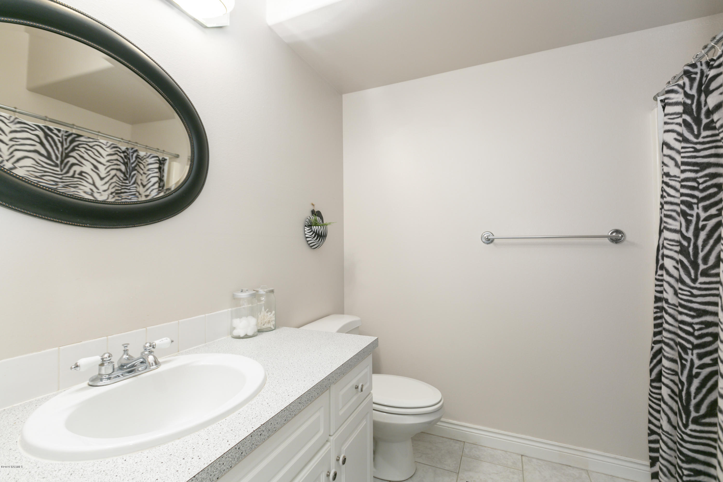 229 Konnowac Pass Road Moxee, WA 98936 - Photo 20 of 25 a bathroom with a toilet and a sink