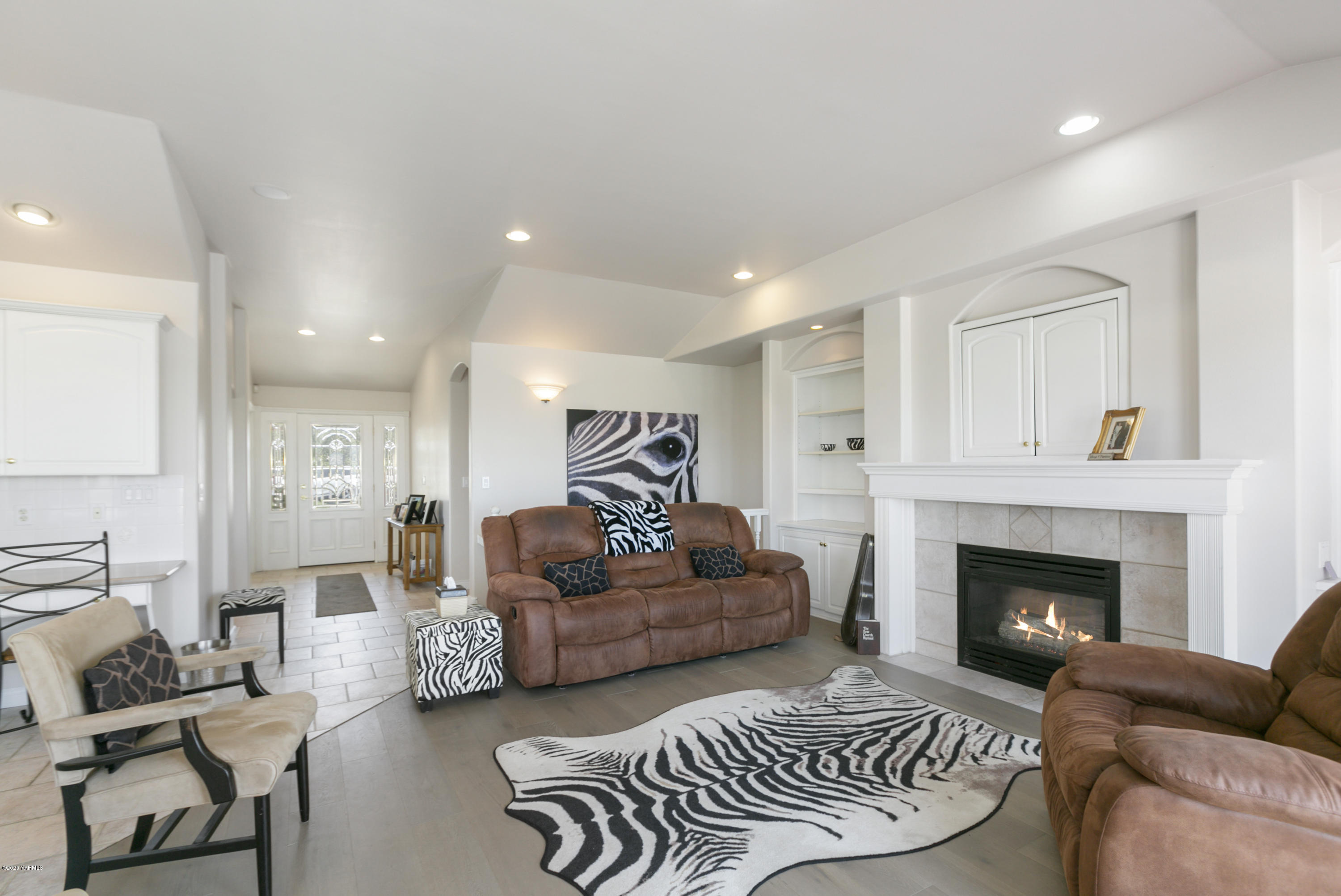 229 Konnowac Pass Road Moxee, WA 98936 - Photo 6 of 25 a living room with furniture and a fireplace