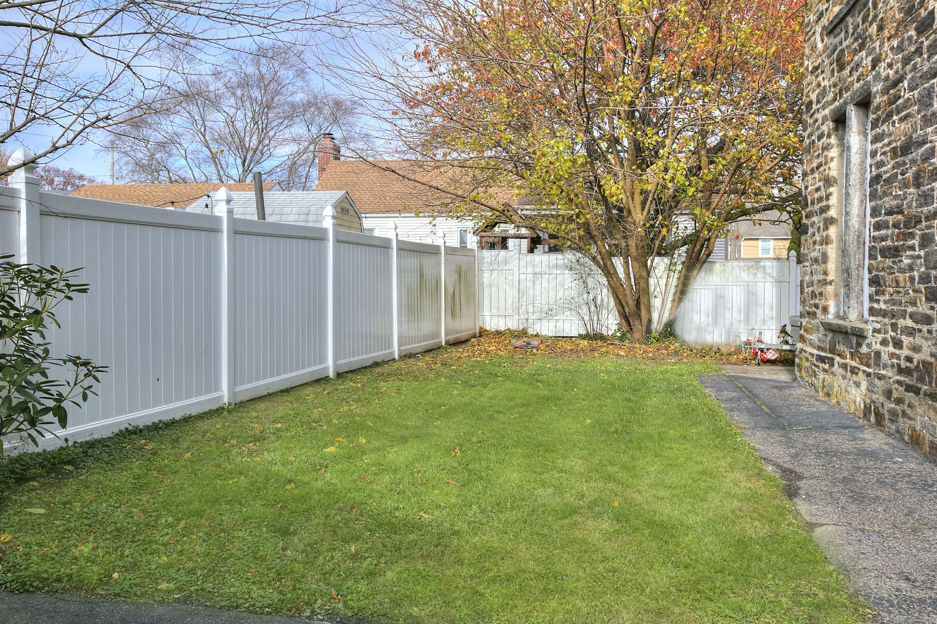 300 Soundview Avenue Fairfield, CT 06825 - Photo 3 of 28 a view of a backyard with large trees