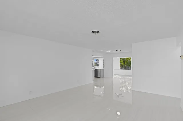 a view of a livingroom with wooden floor