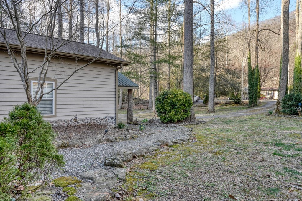 4868 Swallows Creek Road Hiawassee, GA 30546 - Photo 37 of 59 a view of a house with a yard and tree s
