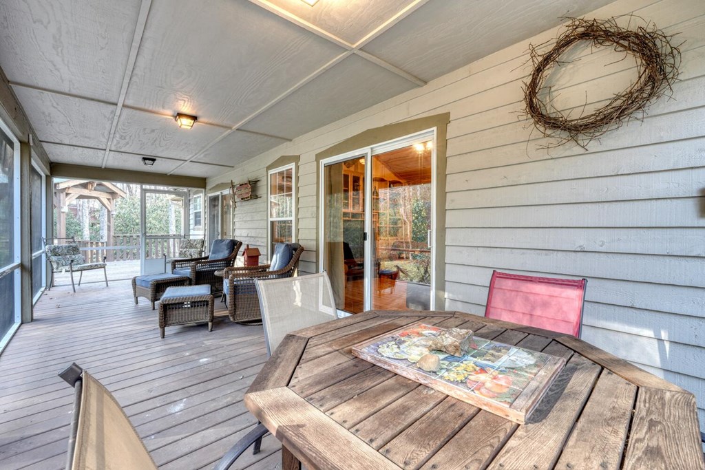 4868 Swallows Creek Road Hiawassee, GA 30546 - Photo 39 of 59 a living room with furniture and wooden floor