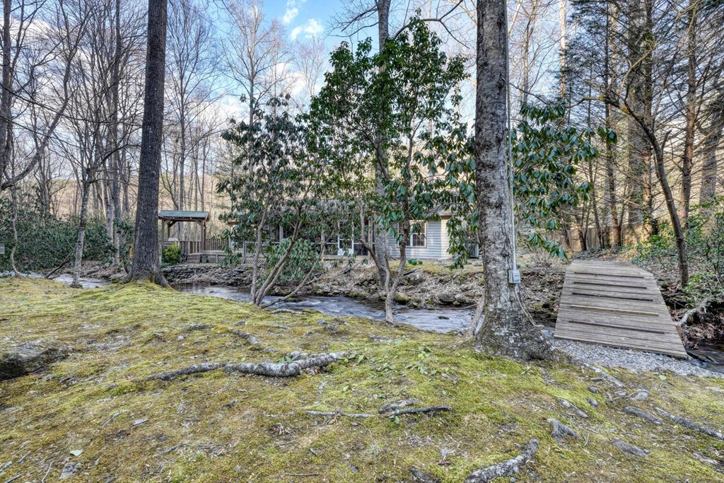 4868 Swallows Creek Road Hiawassee, GA 30546 - Photo 47 of 59 a view of a backyard with chairs