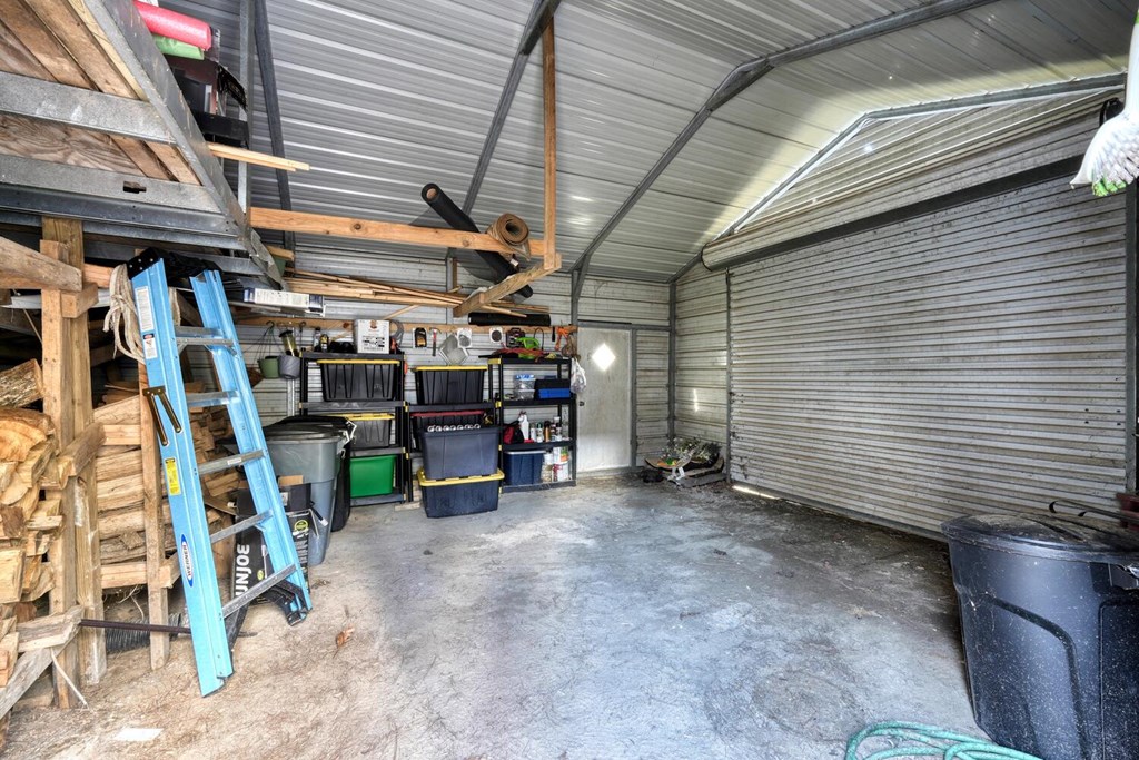 4868 Swallows Creek Road Hiawassee, GA 30546 - Photo 54 of 59 a view of a storage room with racks