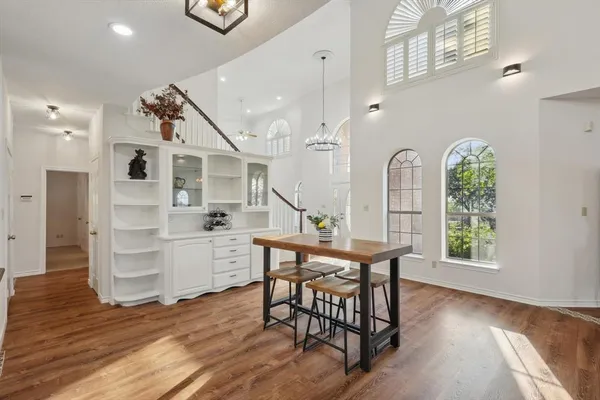 a room with cabinets and wooden floor