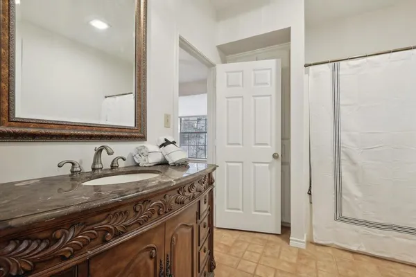 a view of a sink and a mirror