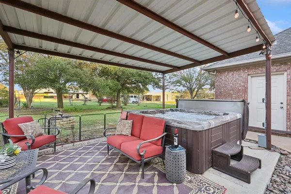 a outdoor space with patio lots of furniture