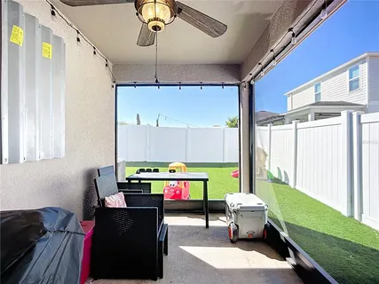 a front view of a house with a garden and deck