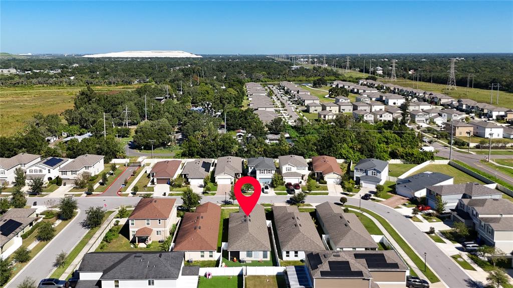 7707 Sunshine Bridge Avenue Gibsonton, FL 33534 - Photo 32 of 33 an aerial view of residential houses with outdoor space