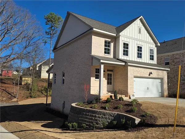 a front view of house with yard