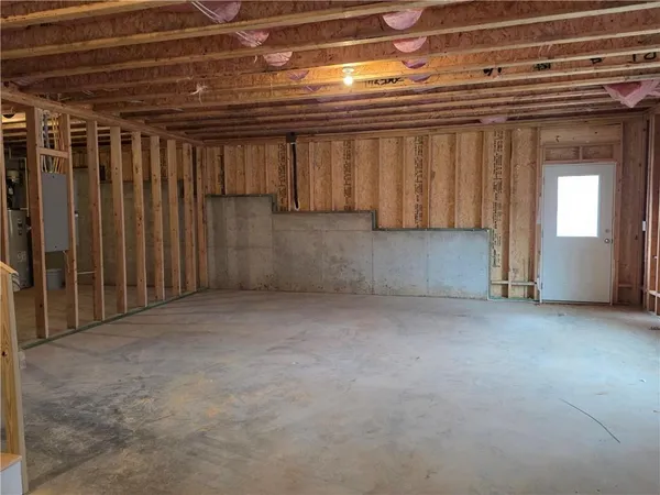 a view of an empty room with windows