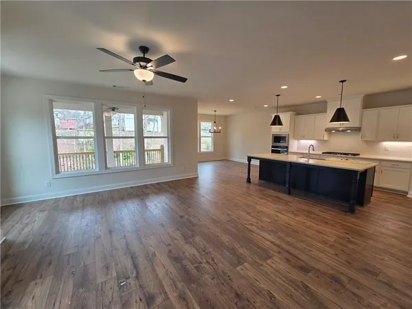 a view of a kitchen with a sink and dishwasher