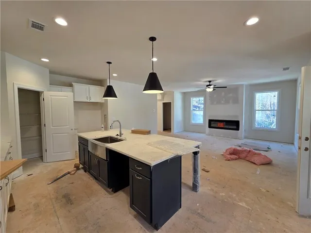 a room with window and ceiling fan