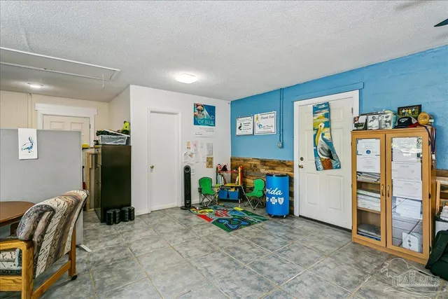 a bedroom with furniture and closet