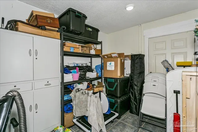 a view of storage and utility room