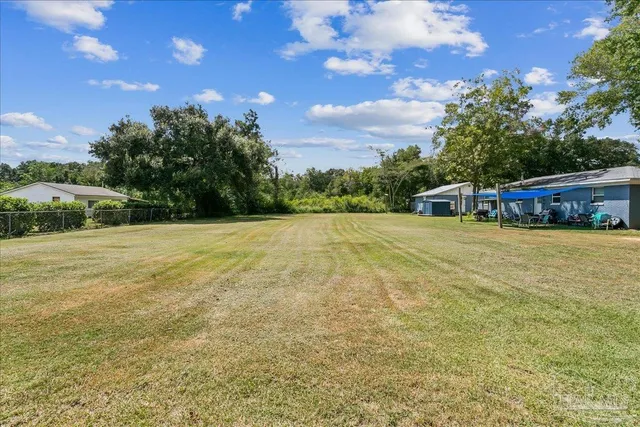 a view of house with outdoor space