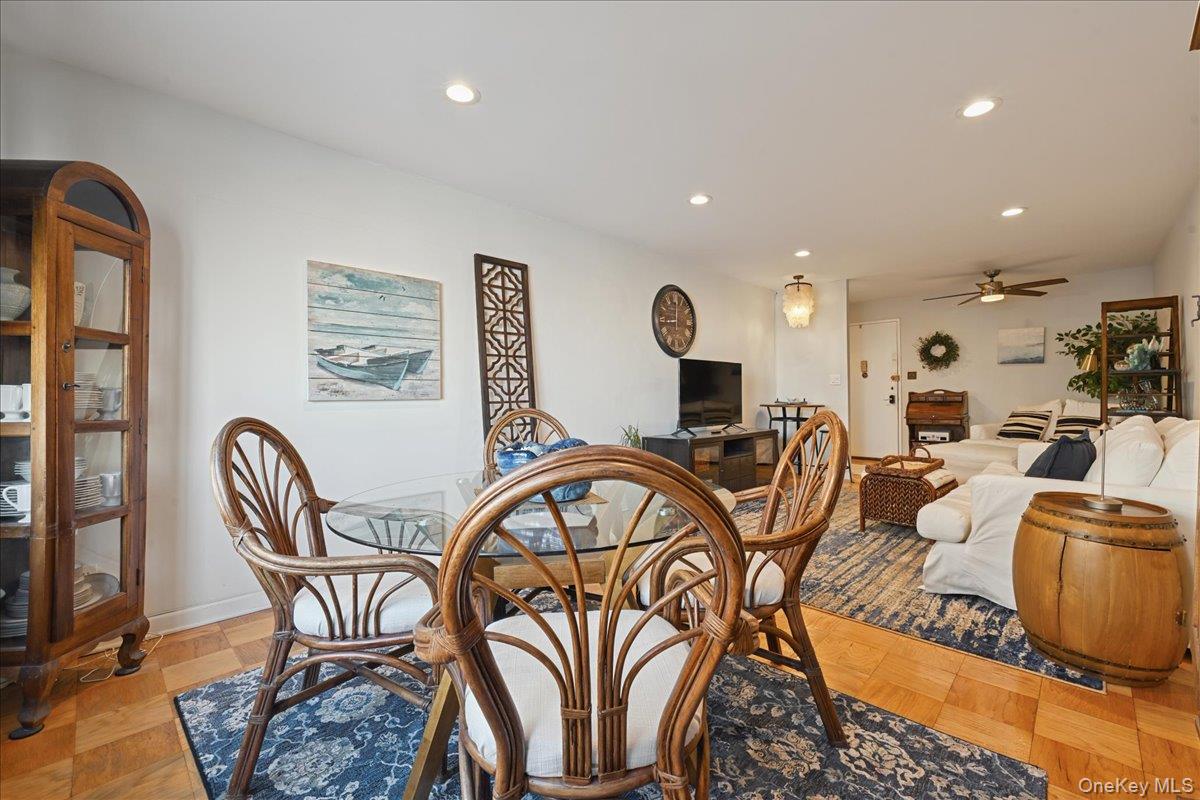 700 Shore Road, Unit 4O Long Beach, NY 11561 - Photo 15 of 42 a very nice looking living room with a large window and furniture