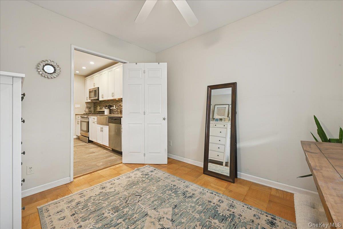 700 Shore Road, Unit 4O Long Beach, NY 11561 - Photo 17 of 42 a view of a kitchen cabinets and wooden floor