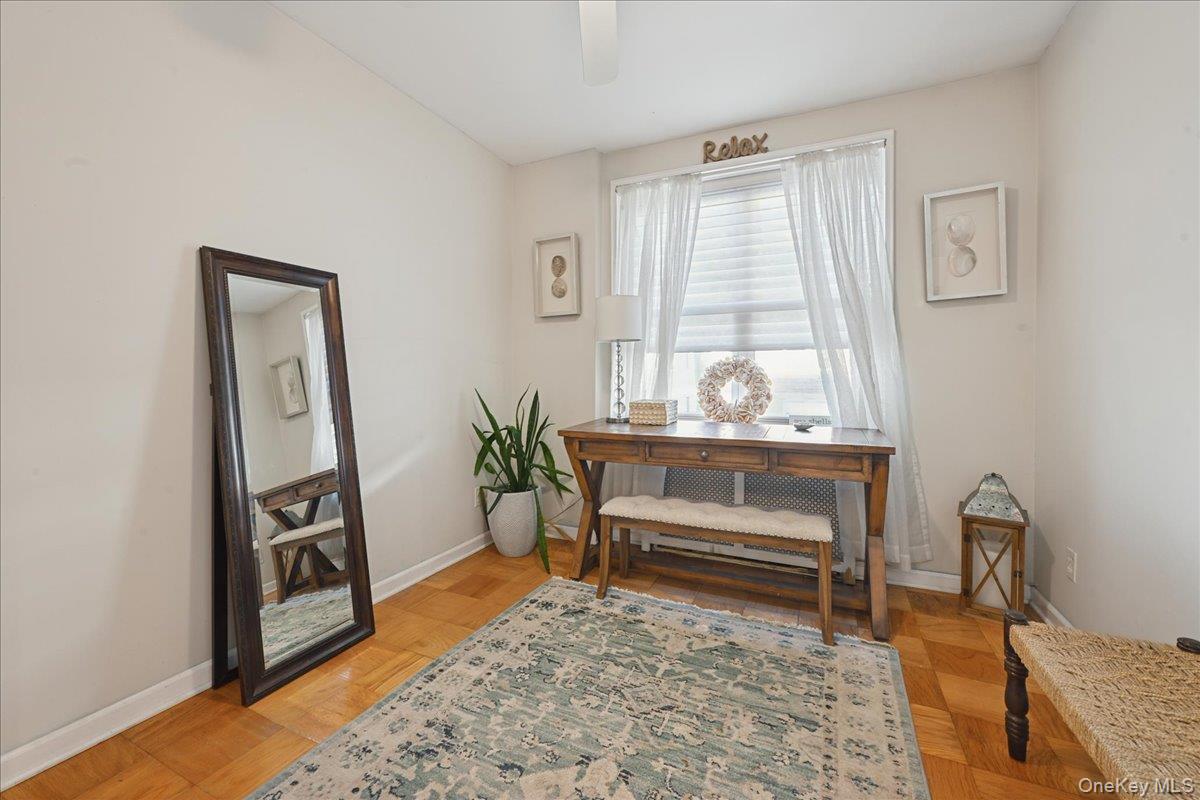 700 Shore Road, Unit 4O Long Beach, NY 11561 - Photo 19 of 42 a living room with furniture and a window