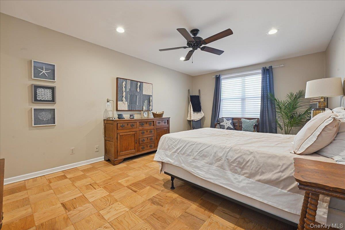 700 Shore Road, Unit 4O Long Beach, NY 11561 - Photo 21 of 42 a bedroom with a bed and dresser