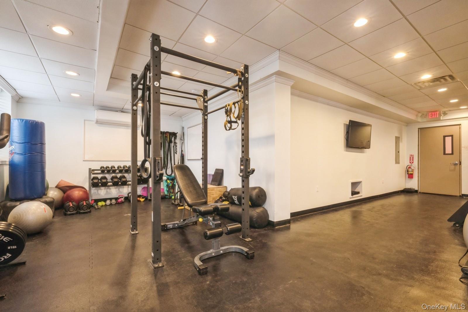 700 Shore Road, Unit 4O Long Beach, NY 11561 - Photo 29 of 42 a view of a room with gym equipment