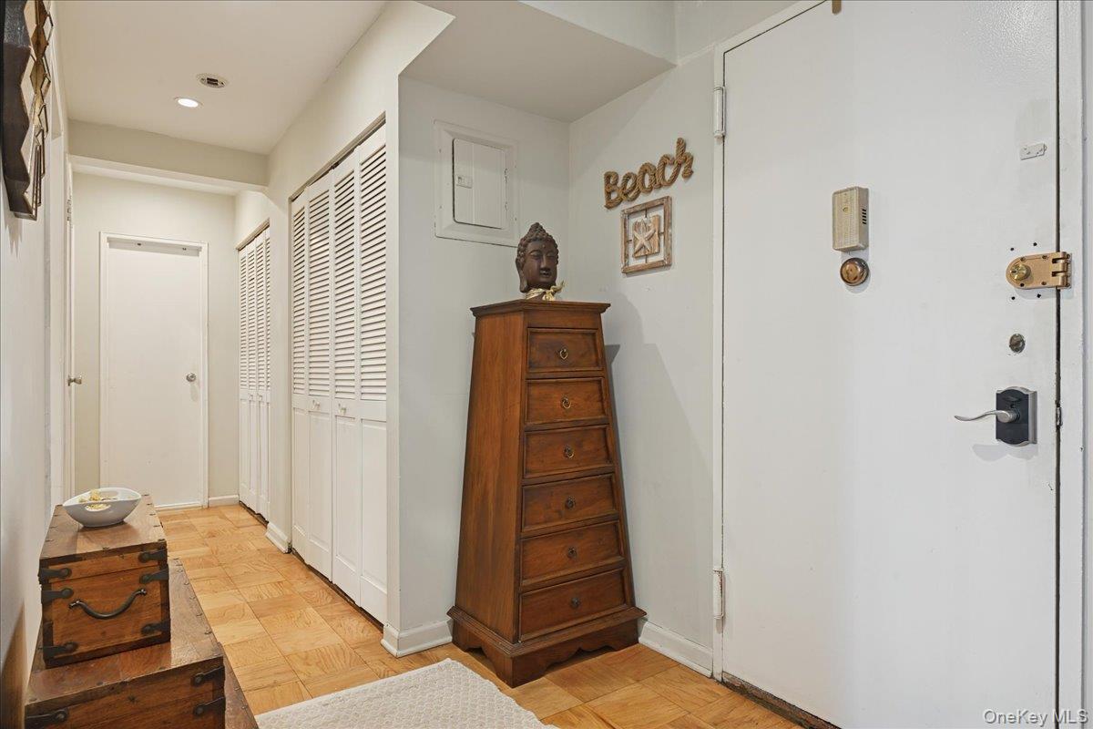 700 Shore Road, Unit 4O Long Beach, NY 11561 - Photo 4 of 42 a view of a hallway with closet