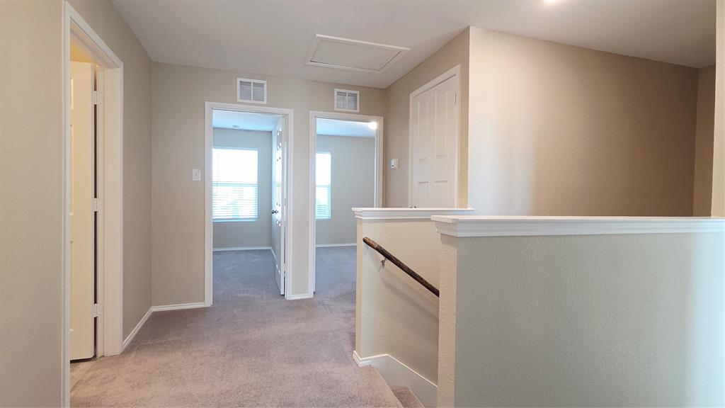 1804 Arcola Court Forney, TX 75126 - Photo 13 of 27 a view of walk in closet with window