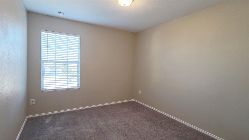 1804 Arcola Court Forney, TX 75126 - Photo 14 of 27 an empty room with a window