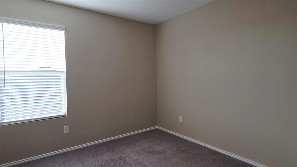 1804 Arcola Court Forney, TX 75126 - Photo 18 of 27 an empty room with a window