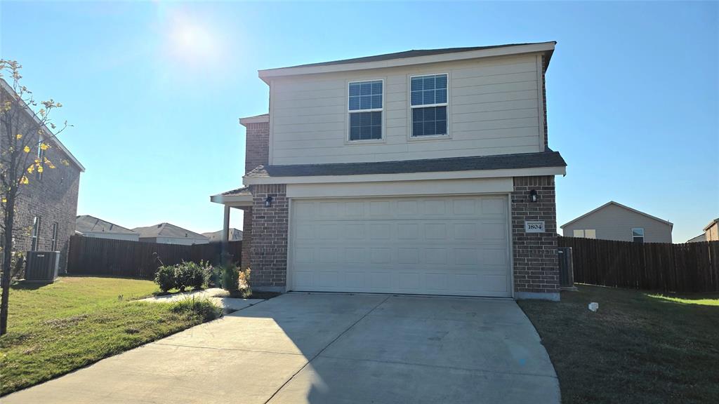 1804 Arcola Court Forney, TX 75126 - Photo 2 of 27 a view of a house with a yard