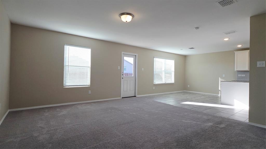 1804 Arcola Court Forney, TX 75126 - Photo 3 of 27 a view of an empty room with a window