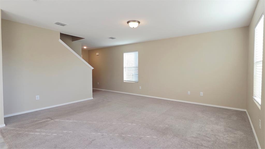 1804 Arcola Court Forney, TX 75126 - Photo 5 of 27 a view of an empty room with a window